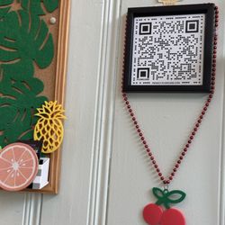 Scam for menu, plus corkboard with local business flyers!