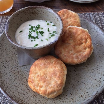Husk - White lily biscuits with black pepper and Husk sausage gravy - Southern Near Me - Nashville, Tennessee