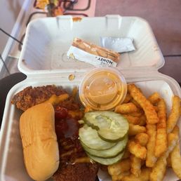 Slider with fries. Pickles came with the sandwich. They also give honey and ketchup as well.