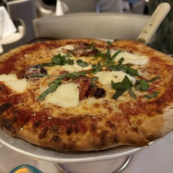 SeaGuini - Opal Sands Resort - margherita pizza - a classic, oven-roasted tomatoes, fresh mozzarella cheese, housemade pomodoro sauce, torn basil - New American Near Me - Clearwater, Florida