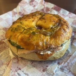 Lox on jalapeño cheddar bagel with garlic cream cheese. Lox on jalapeño cheddar bagel with garlic cream cheese.