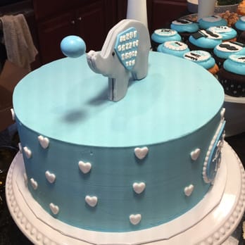 Edibles Incredible Desserts - This is the cake they ended up delivering: cardboard topper, cream cheese decor instead of fondant - Desserts Near Me - Sterling, Virginia