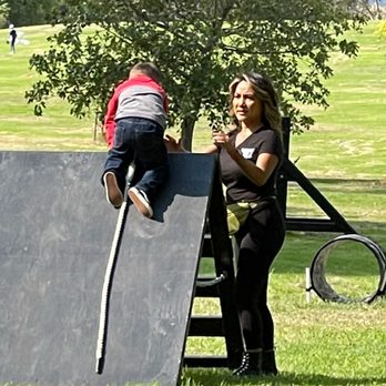 Ninja Dude Parties - My son climbing one of the obstacles with assistance from the "Ninja Party Dude" team - Party & Event Planning Near Me Ninja Dude Parties - My son climbing one of the obstacles with assistance from the "Ninja Party Dude" team - Party & Event Planning Near Me
