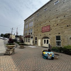 Museum entrance next to Betsy's yarn and tea shop to the left