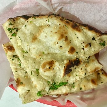 Tandoori Flame - Freshly-made garlic naan - Indian Near Me - Indianapolis, Indiana Tandoori Flame - Freshly-made garlic naan - Indian Near Me - Indianapolis, Indiana