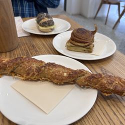 Joseph Brot - Cheese bread in foreground.