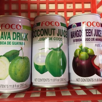 Asia Market - three cans of coconut drink on a shelf - International Grocery Near Me - Boise, Idaho Asia Market - three cans of coconut drink on a shelf - International Grocery Near Me - Boise, Idaho