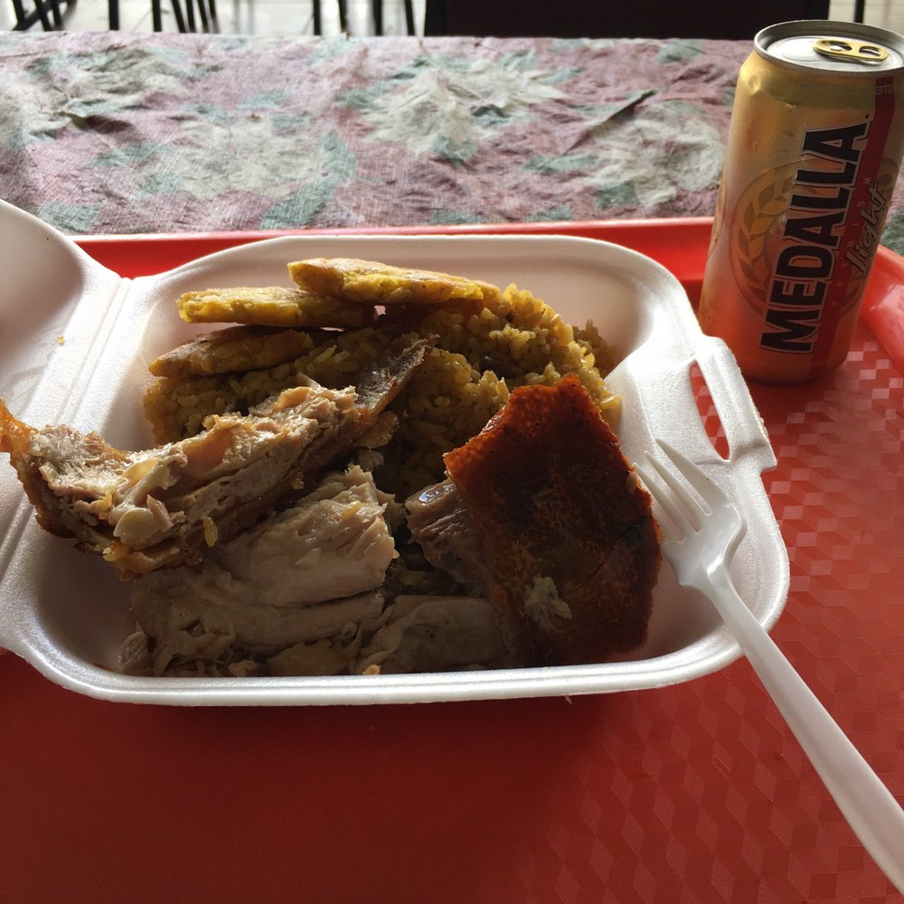 Lechonera El Mojito - Just your typical carne puerco asado con arroz con gandules. Of course you have to wash it all down with a local Medalla! - Barbeque Near Me - Cayey, Puerto Rico