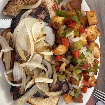 DeAvila's Restaurant & Catering - Open face steak sandwich with added grilled onions and a side of home fries with peppers and onion - Breakfast & Brunch Near Me - Taunton, Massachusetts DeAvila's Restaurant & Catering - Open face steak sandwich with added grilled onions and a side of home fries with peppers and onion - Breakfast & Brunch Near Me - Taunton, Massachusetts