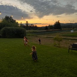 two children playing in a field