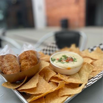 Empamamas - a tray of chips and a bowl of dip - Empanadas Near Me - Tampa, Florida