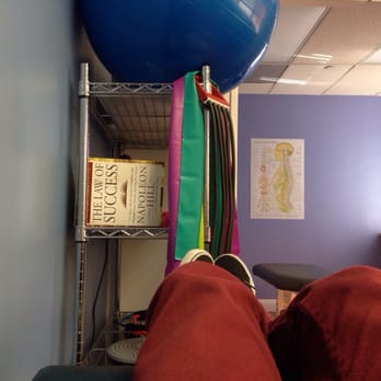 Genesis Chiropractic & Wellness Center - the law of the success - great book, and a bunch of therapy stuff - Chiropractors Near Me - Glendale, California