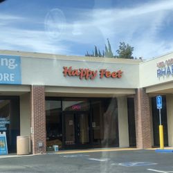 Happy Feet - Is nice inside and they have a water fountain, very tranquil. Is strictly professional. Now go get Happy..feet..not ending..you perv