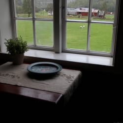 Brekke Gard Hostel - A common reading or writing nook on the second floor, looking out on the sheep meadow next door.