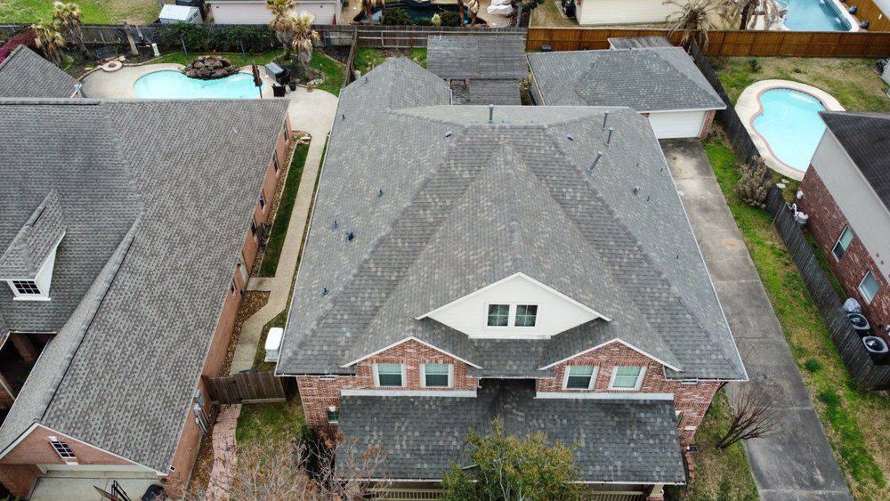 Slide of Space City Roofing & Remodeling