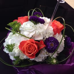 The beautiful custom arrangement made on-the-spot! They even packaged it in a box for easier transporting.