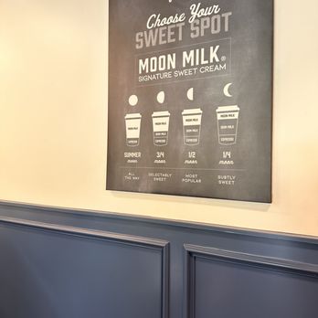 Summer Moon Coffee - Their summer moon coffee - A black and white menu board at Summer Moon Coffee shows various moon milk options with different sweetness levels. - Coffee & Tea Near Me - Spring, Texas