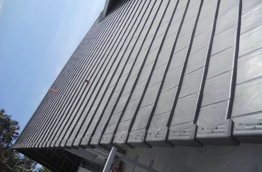 Slide of Progressive Roofing