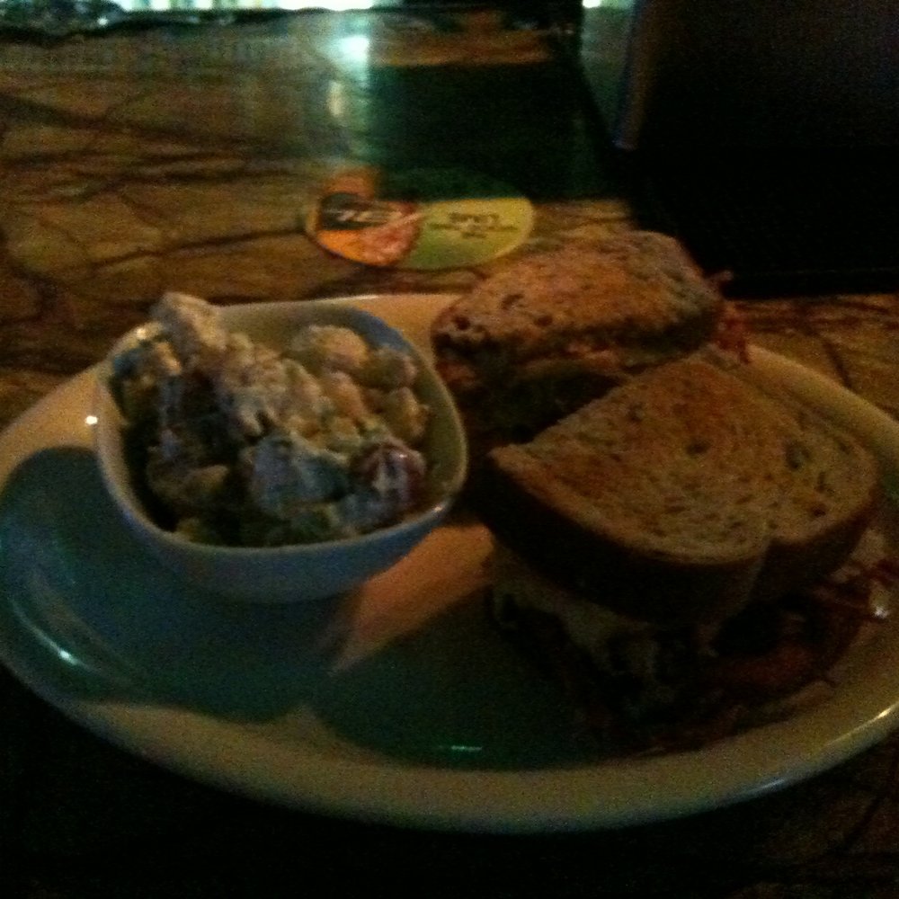 McSharry's Irish Pub - Low light photo of reuben and potato salad - Pubs Near Me - Fairhope, Alabama McSharry's Irish Pub - Low light photo of reuben and potato salad - Pubs Near Me - Fairhope, Alabama