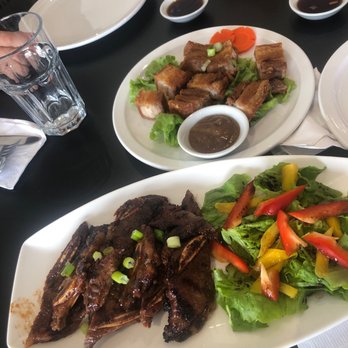 Fan “D” Flame - two plates of food on a table - Filipino Near Me - Brampton, Ontario