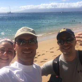 Dave's Metal Detecting - Dave, my wife, and me after he found my ring. - Metal Detector Services Near Me - Kihei, Hawaii Dave's Metal Detecting - Dave, my wife, and me after he found my ring. - Metal Detector Services Near Me - Kihei, Hawaii
