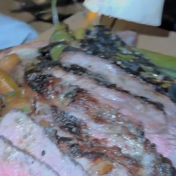 Toro Scottsdale - showing some of the meat looking medium. - Latin American Near Me - Scottsdale, Arizona