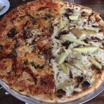 Custom Pie and Bar - Half an El Diablo and half potato bacon. Both are tasty! - Pizza Near Me - Moorpark, California Custom Pie and Bar - Half an El Diablo and half potato bacon. Both are tasty! - Pizza Near Me - Moorpark, California