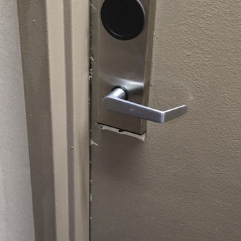Hampton Inn Raleigh/Cary - Room door looks like it's been kicked in and repaired. - Hotels Near Me - Cary, North Carolina