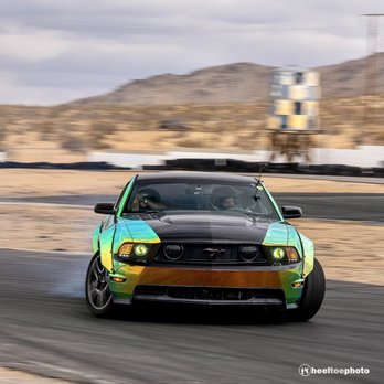 Innovated Design - Sideways shot of the mustang wrapped by innovated designs at avs - Vehicle Wraps Near Me - Temecula, California Innovated Design - Sideways shot of the mustang wrapped by innovated designs at avs - Vehicle Wraps Near Me - Temecula, California