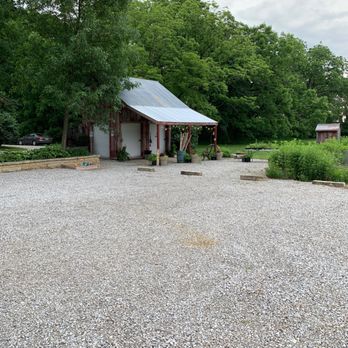 Lowa Grown - a gravel parking lot with a building in the background - Farmers Market Near Me - West Branch, Iowa Lowa Grown - a gravel parking lot with a building in the background - Farmers Market Near Me - West Branch, Iowa