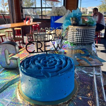 Loft22 Cakes - a birthday cake on a table - Cupcakes Near Me - Fort Worth, Texas Loft22 Cakes - a birthday cake on a table - Cupcakes Near Me - Fort Worth, Texas
