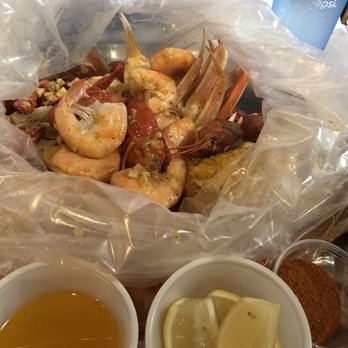 Laughing Crab - Shrimp, snow crab, crawfish combo, comes with corn and potatoes - Seafood Near Me - Tyler, Texas
