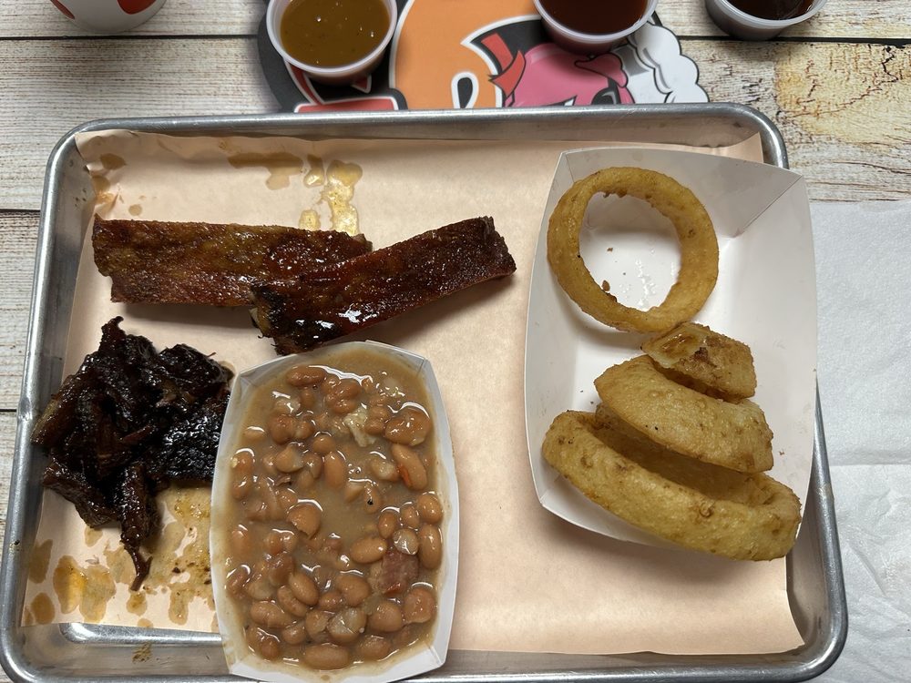 Woody's Q Shack Logo