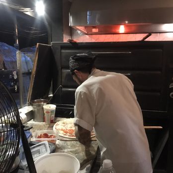 Revolution Pizza Shop - Kevin workin the ovens. I was sitting at the counter and got to watch and I feel this pizza place needs to be busy everyday - Pizza Near Me - Luquillo Beach, Puerto Rico Revolution Pizza Shop - Kevin workin the ovens. I was sitting at the counter and got to watch and I feel this pizza place needs to be busy everyday - Pizza Near Me - Luquillo Beach, Puerto Rico