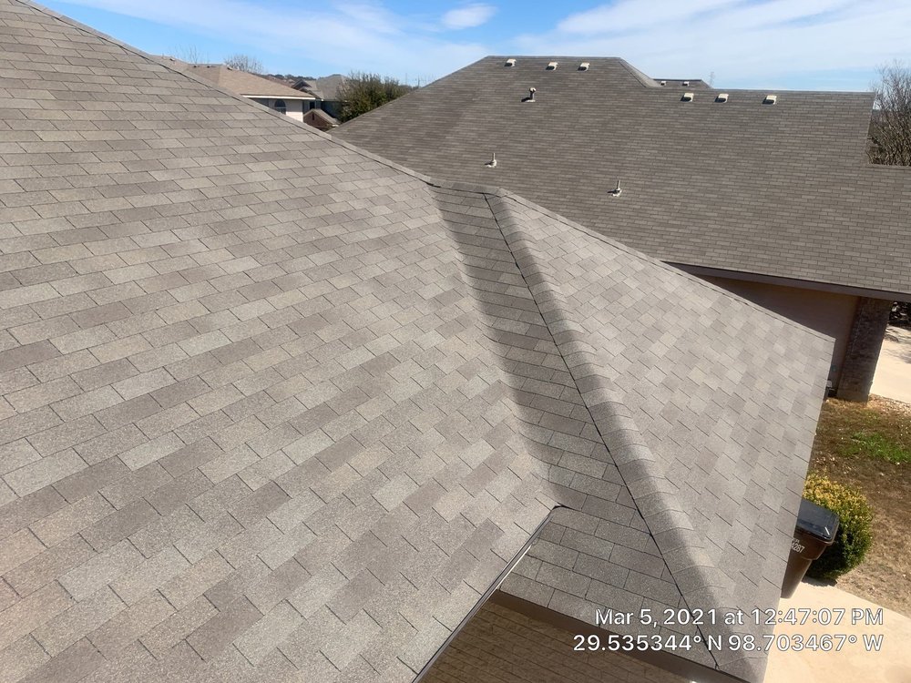 Slide of DV Roofing and Remodeling