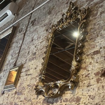 Marioochi’s Pizzeria - Cool mirrors on the old brick wall - Pizza Near Me - Sparta, Tennessee