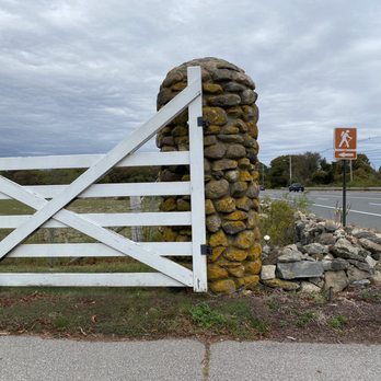 Sunset Farm - a white gate and stone wall - Farmers Market Near Me - Narragansett, Rhode Island