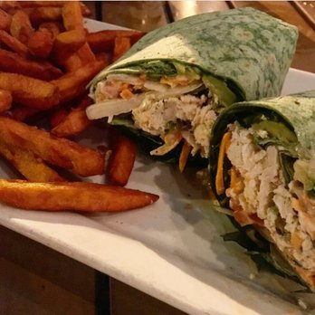 Union Pub - Tomato Basil Chicken Wrap w/ avocado, basil, onion, carrots, baby spinach, and pesto & sweet potato fries - Pubs Near Me - Washington, DC, District of Columbia
