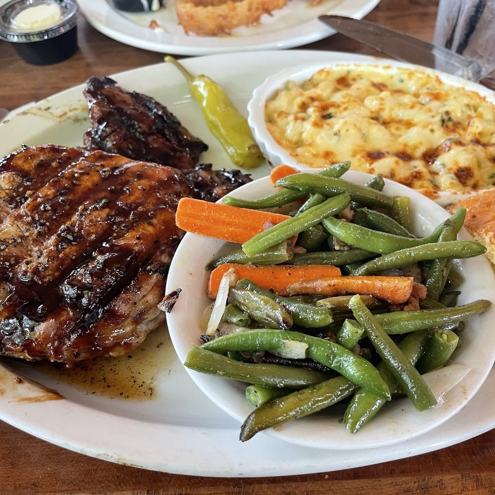Old Canal Smoke House - Bourbon glazed pork ribeyes skillet green beans and mac & cheese - Barbeque Near Me - Chillicothe, Ohio Old Canal Smoke House - Bourbon glazed pork ribeyes skillet green beans and mac & cheese - Barbeque Near Me - Chillicothe, Ohio