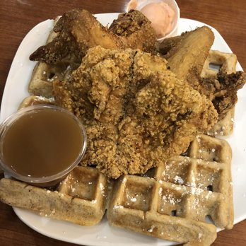 Dame's Chicken and Waffles - Buff Brahamas with two wings and one cutler with strawberry smear. Sweet potato waffle. - New American Near Me - Cary, North Carolina Dame's Chicken and Waffles - Buff Brahamas with two wings and one cutler with strawberry smear. Sweet potato waffle. - New American Near Me - Cary, North Carolina