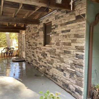 TAC-1 Services - a patio with a table and chairs - Chimney Sweeps Near Me