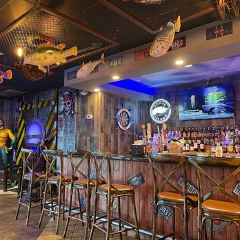 Hungry Crab - a bar with fish decorations on the walls - Seafood Near Me - Orlando, Florida