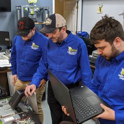 Totally Covered - Active team working on an All in One Desktop computer
