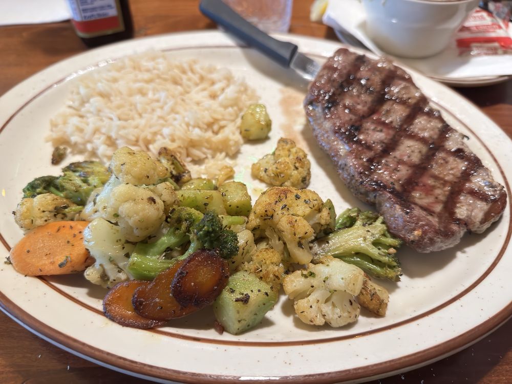 The Branding Iron Café & Steakhouse Logo