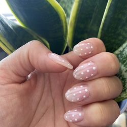 Nails & Spa - Short Polka dot nude color acrylic nails.