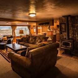 North Shore Lodge - Living Room in the three bedroom Lake Granby Suite (unit 1)