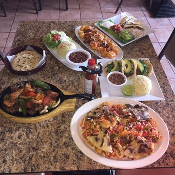 Caliente Restaurant & Bar - Assorted dishes - Latin American Near Me - Silver Spring, Maryland Caliente Restaurant & Bar - Assorted dishes - Latin American Near Me - Silver Spring, Maryland