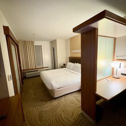 Springhill Suites by Marriott - Good-sized room with small separated sitting area to the right.