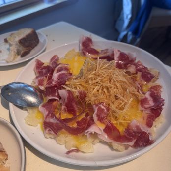BCN Taste & Tradition - Egg yolk carpaccio - Catalan Near Me - Houston, Texas