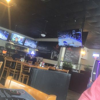 Fork'n Links - a man sitting at a table in a restaurant - Sports Bars Near Me - Myrtle Beach, South Carolina Fork'n Links - a man sitting at a table in a restaurant - Sports Bars Near Me - Myrtle Beach, South Carolina